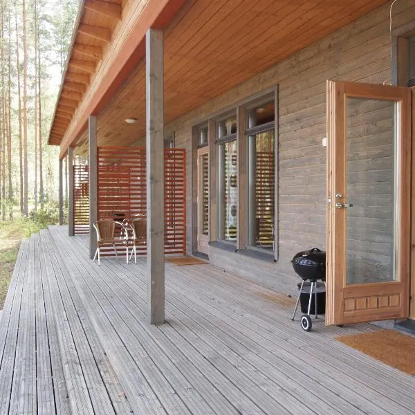 Kuoreksenniemi Villas & Lakehouse, hotell i Puumala