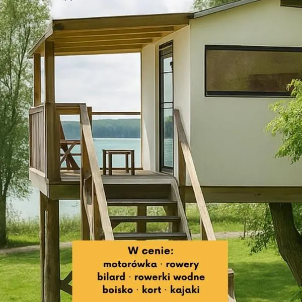 Herbals - Tree&Lake houses with bath, sauna, bikes, motorboat, hotel v mestu Mielno
