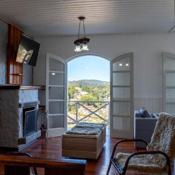 Casa com lareira, Wi-Fi e varanda com vista