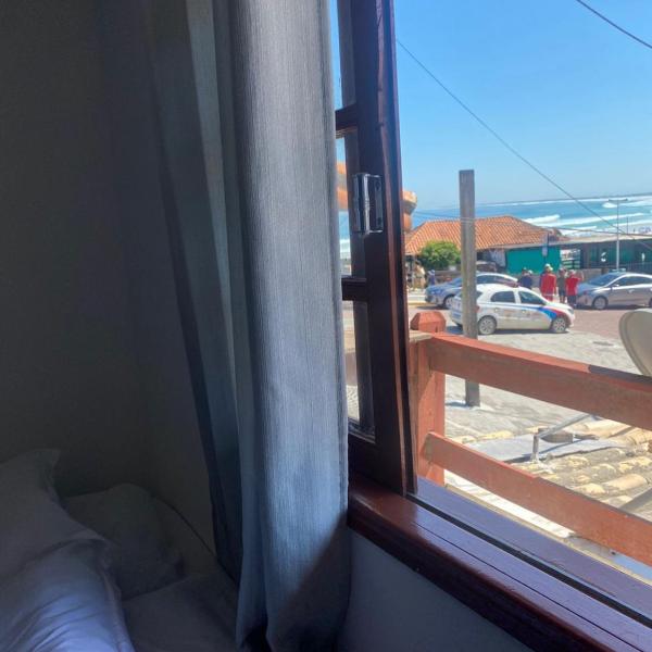Suites e Quartos Em frente a Praia Grande -Na orla Flavia Alessandra