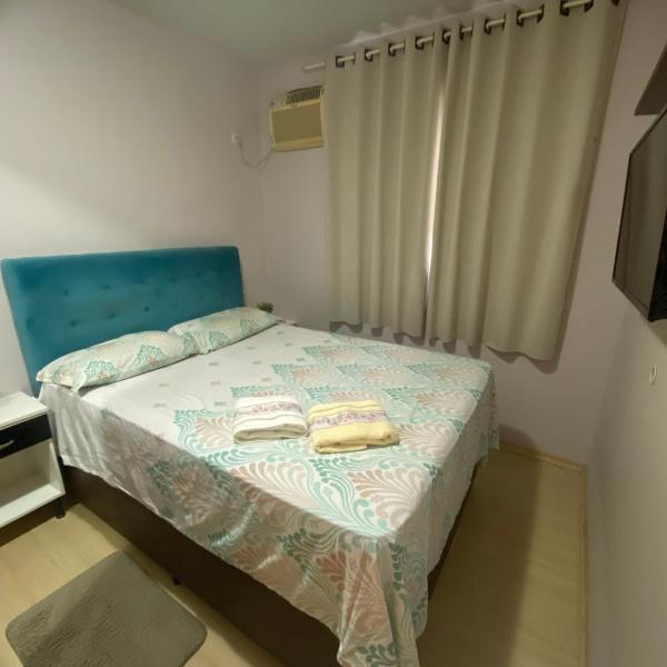 Quarto aconchegante com banheiro