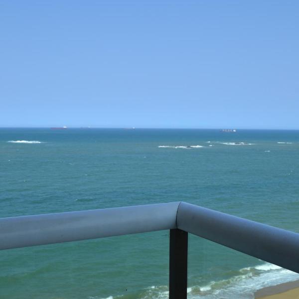 Flat encantador com vista para o mar