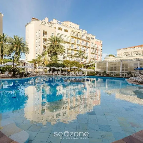Suíte com vista para praia dentro de hotel - Seazone ILCTOP, hotel di Florianópolis