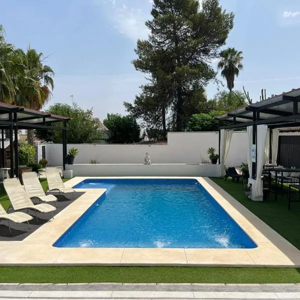 Apartamento 1, Chalet Manzano a 15" de Sevilla, a 30" del Aeropuerto de Sevilla, hotel en Villanueva del Ariscal