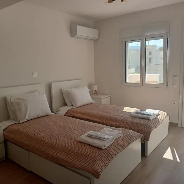 IVory Suites near Athens Airport，位于斯巴达的酒店