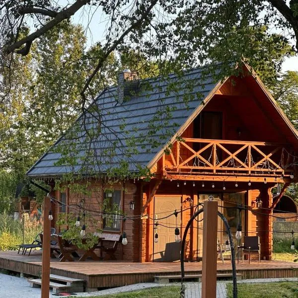 Poleskie zacisze, domek czapla na wyłączność, kominek, balia,sauna, hotel in Helenin