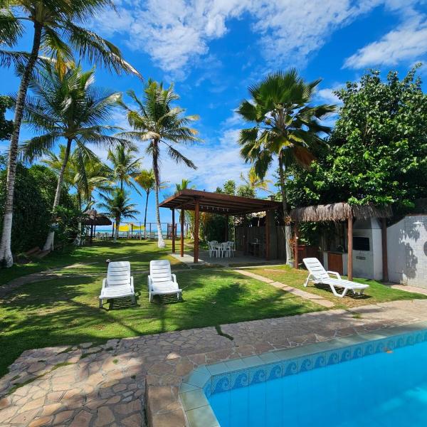 Belíssima casa 2 suites beira mar em condomínio com piscina, pe na areia - Foto 4