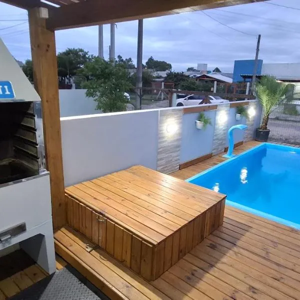Casa aconchegante em nova tramandai centro, hotel in Tramandaí