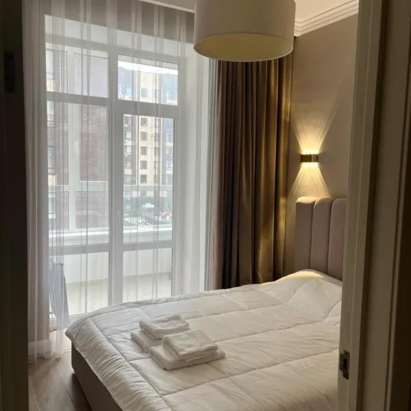 Уютная квартира в ЖК Alpamys в центре, hotel in Astana