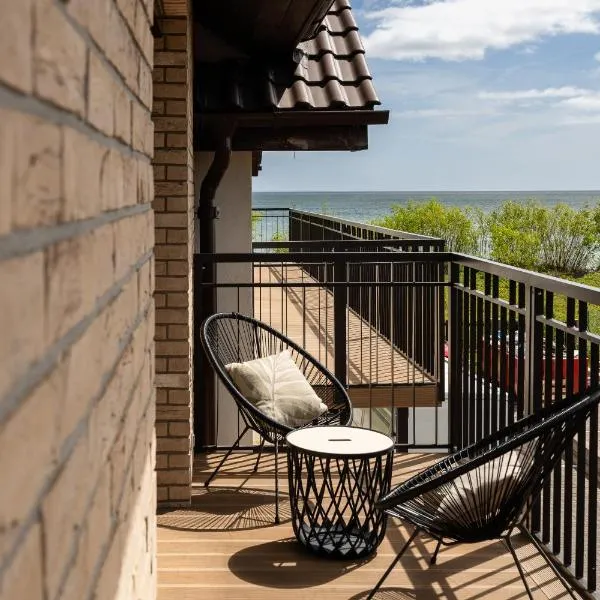 Bursztynowy Widok - apartament z bezpośrednim dostępem do plaży oraz widokiem na morze, hotel in Rewa