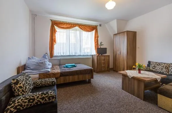 Apartamenty i Pokoje Gościnne DZIEDZIC Józef โรงแรมในซุเค