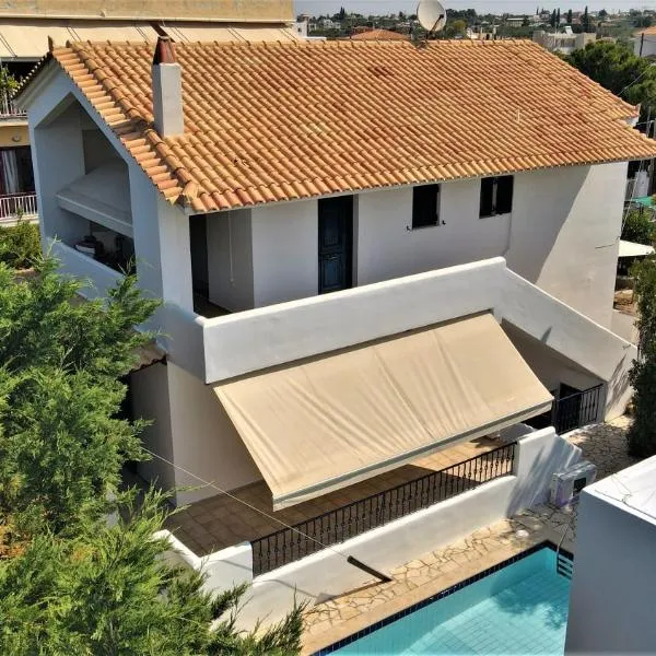 Dionysus Blue Sky, מלון באגינה טאון