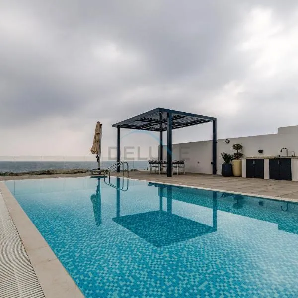 Stunning Sea Views from the Private Pool, Mins Away from Pristine Beaches and Key Fujairah Attractions, Sharm Al Dana Villa, Fujairah by Deluxe Holiday Homes, hotel in Fujairah