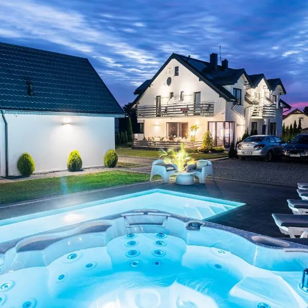 Cichy Domek - Podgrzewany Basen, Sauna i Jacuzzi w Cenie Pobytu, hotel in Karwia