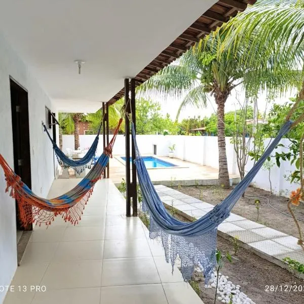 Praia, piscina e churrasco - Enseada dos Golfinhos - Ilha de Itamaracá, hotel in Itamaracá