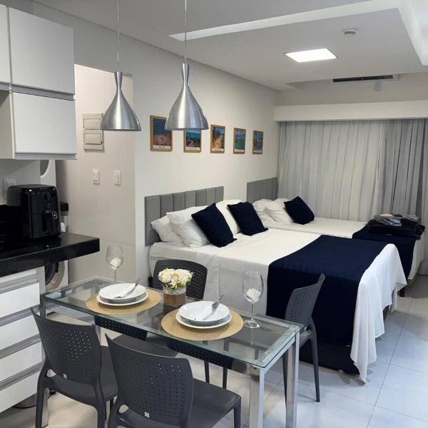 Flat com piscina a 50m da praia