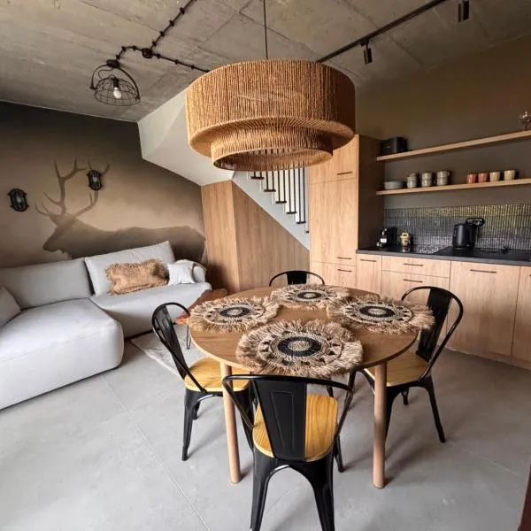 Siedlisko na wydmach, sauna,podgrzewane jacuzzi,domki klimatyzowane,starlink internet,parking, hotel in Łeba