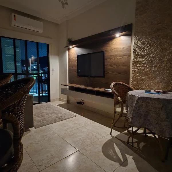 Aconchego e conforto na praia, hotel di Guarujá