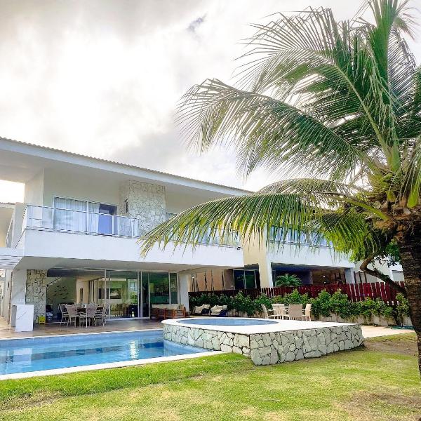 Luxo pé na areia com piscina e jacuzzi - 6 suítes