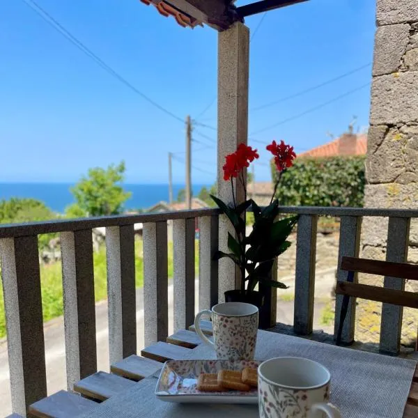 Tiny house with sunset over the ocean, hotel a Oia