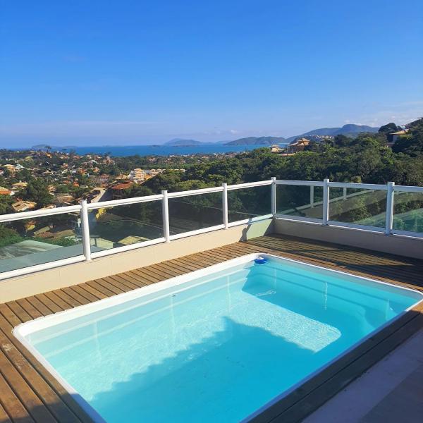Casa com cobertura de vista para o mar