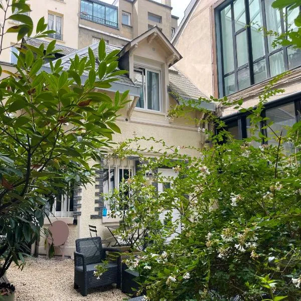Love House - Maison entière et son jardin - Rare à Paris, hotel en París