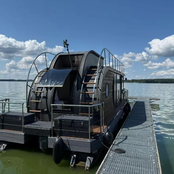 WOHLFÜHLBOOT Hausboot - Festlieger in der Marina Zaue am Schwielochsee - incl Stand Up Board, hotel in Schwielochsee
