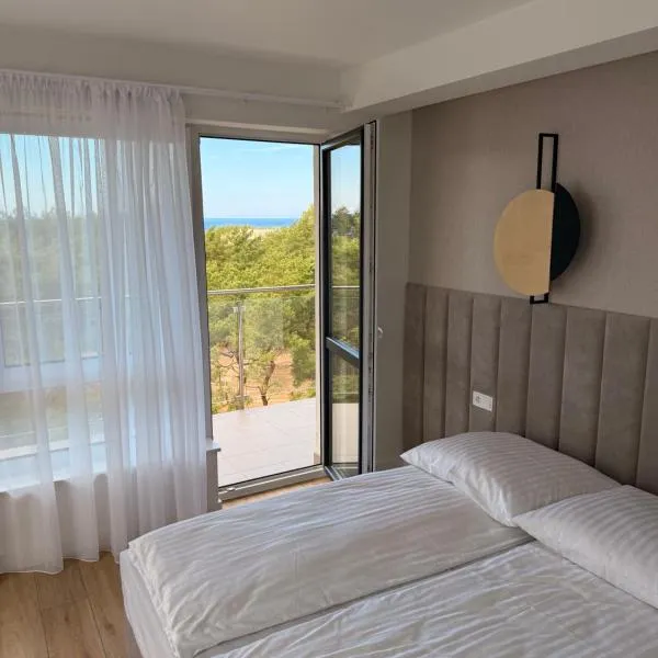 Apartamenty Solano z widokiem na morze, hotel a Rowy