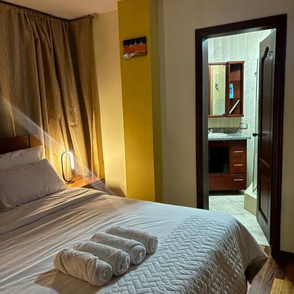 Cómodo apartamento con aire puro y vista panorámica ideal para turistas, hotel in Ambato