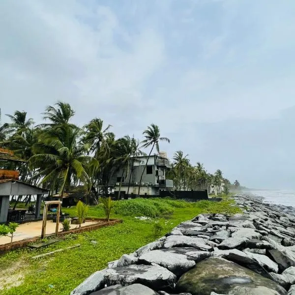 Beach at Deltin, hotel in Udupi