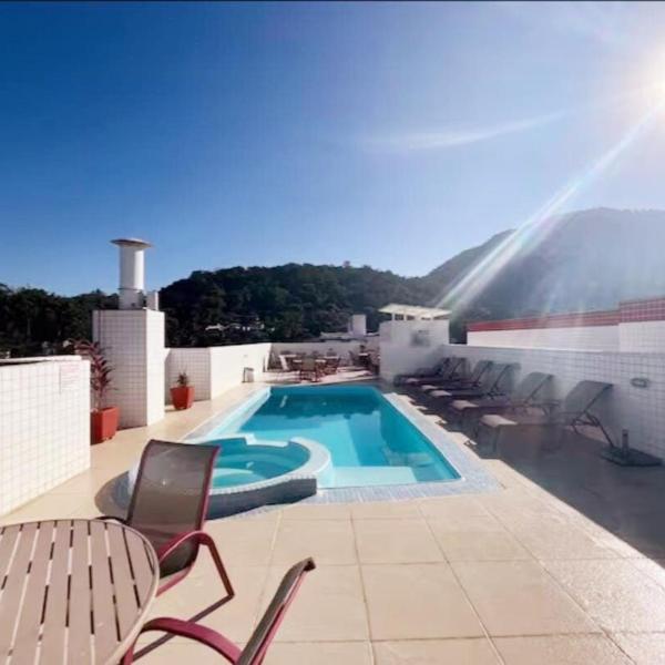 Apartamento com piscina a 200m da praia Toninhas - Foto 4