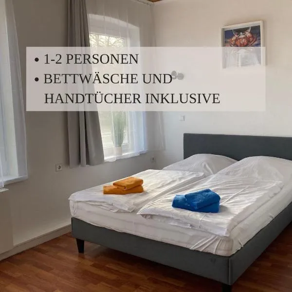 Haus Krabbe Zimmer ohne Küche, zentral gelegen zwischen Cuxhaven und Bremerhaven, Unterstellmöglichkeit für Fahrräder und E-Bikes, hauseigener Parkplatz, Hunde kostenfrei willkommen, hotel in Wremen