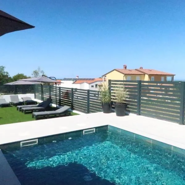 Ferienhausanlage Adria Oasis, viešbutis mieste Višnjanas