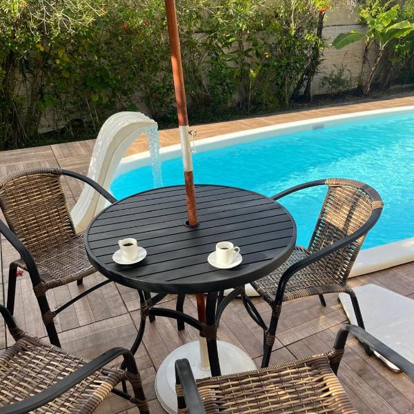 Casa com piscina de 7m x 3,5m com garagem, quintal e jardim em Mongaguá - Foto 4