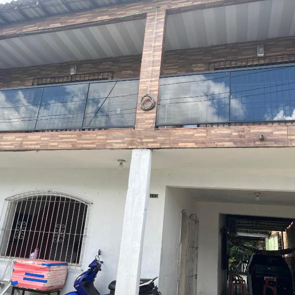Casa dois andares com varanda