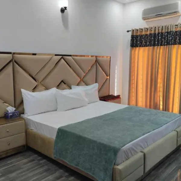 Four Season Guest House, hotel em Islamabad