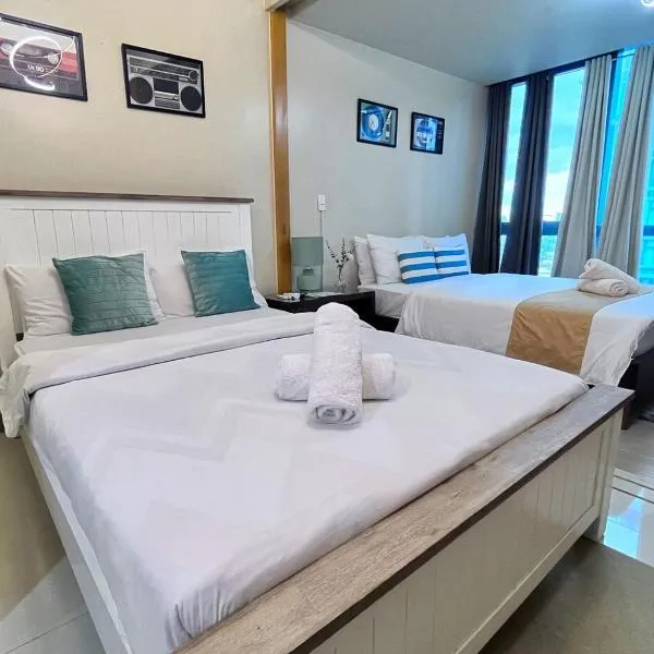 Uptown Mall Linked 1BR 2 Beds Best Value BGC, hotel en Manila