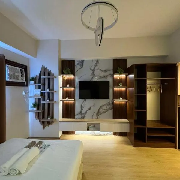 Honey's Cosy staycation studio unit at Lahug IT PARK with free pool plus sauna and gym facilities, Hotel in Cebu City