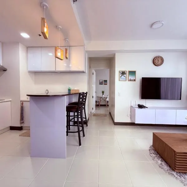 Bright & Cozy High-Rise Condo, Hotel in Pulong Cacawate