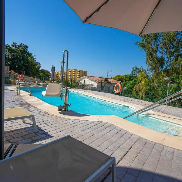 Encantos de Montemar โรงแรมในตอร์เรโมลิโนส