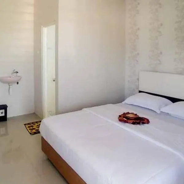 Griya Mulya near Alun Alun Batu Mitra RedDoorz, hotel in Batu