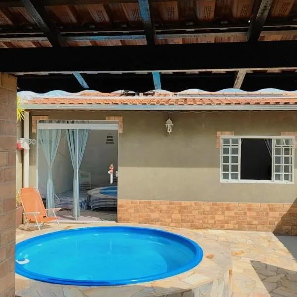 Casa Espaço Sara Piscina Aquecimento Solar total privacidade, área gourmet completa com churrasqueira fogão a lenha, a 5min do centro e do parque das águas, hotel in São Lourenço