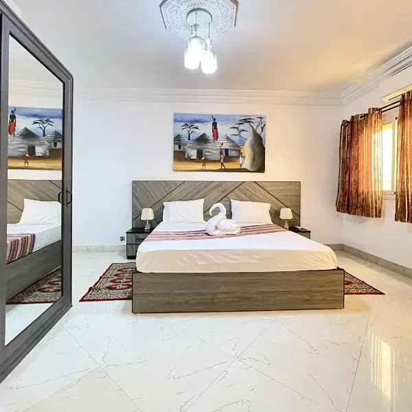 Touraco Suite Hôtel Business, hotel in Mbour