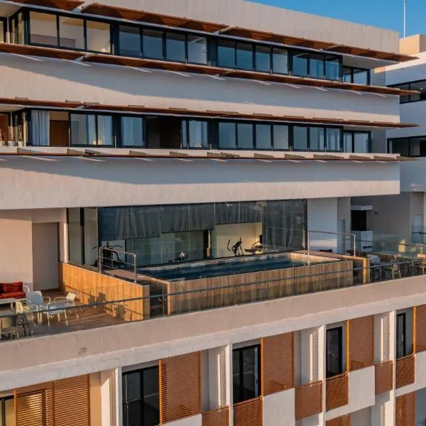 Confort y estilo en Galería 360 con piscina y gimnasio、サントドミンゴのホテル