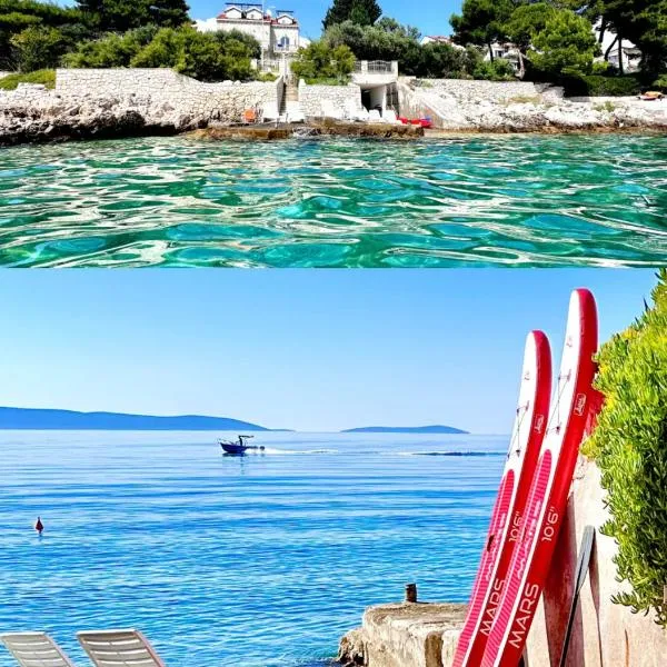 Luxury Seaside Villa with a classic Mediterranean Olive Garden, a fully equipped Professional Kitchen, Pool, Sauna, Padle Boards and Canoe - Miolin Beach House, hotel en Trogir