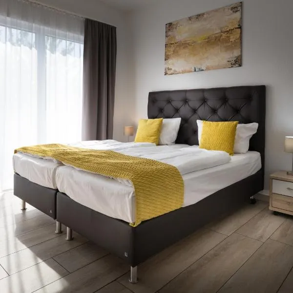 GLEUEL INN - digital hotel & serviced apartments & boardinghouse mit voll ausgestatteten Küchen, hotel in Hürth