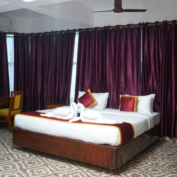Pournami Inn, hotell sihtkohas Chengannūr