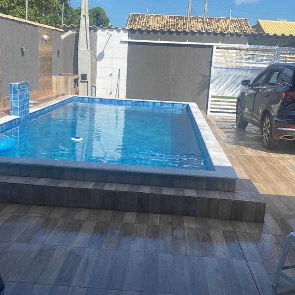 Casa em itanhaem com piscina, churrasqueira a poucos minutos da praia
