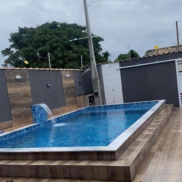 Casa em itanhaem com piscina, churrasqueira a poucos minutos da praia - Foto 4