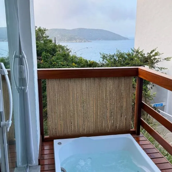 Loft Santorini com hidro aquecida - Arraial do Cabo, hotel in Arraial do Cabo